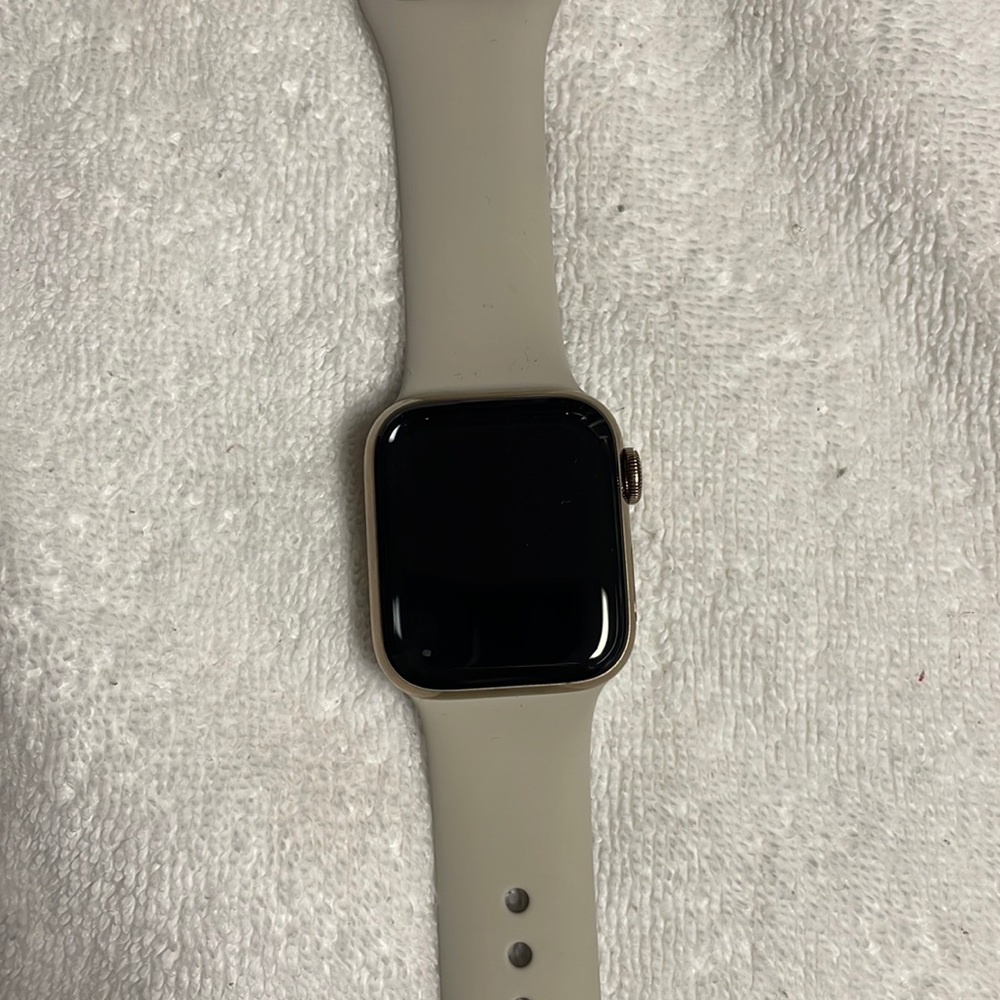 Apple Watch Series 5 Gold Stainless Steel Case with Silcone band.